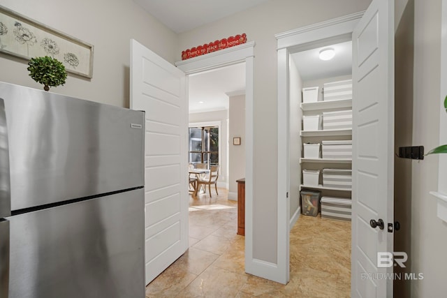 interior space with light tile patterned floors