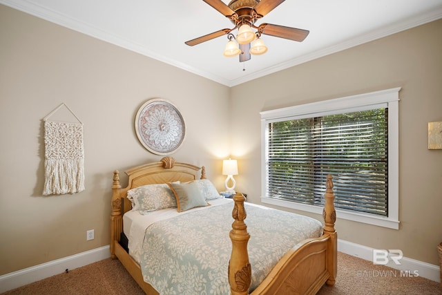 carpeted bedroom featuring ornamental molding and ceiling fan