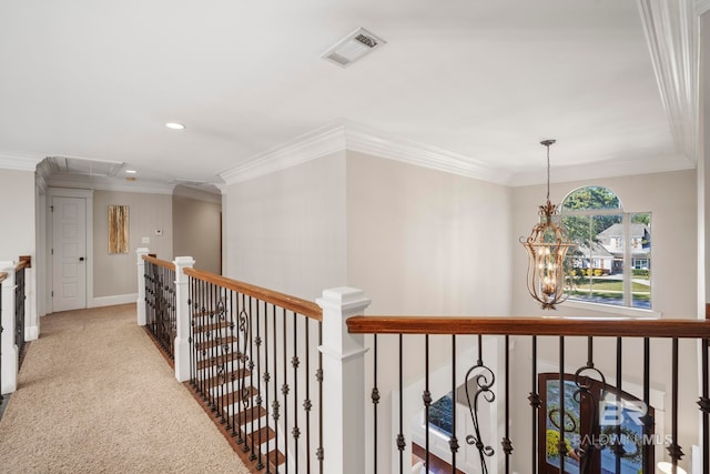 hallway with light carpet and ornamental molding