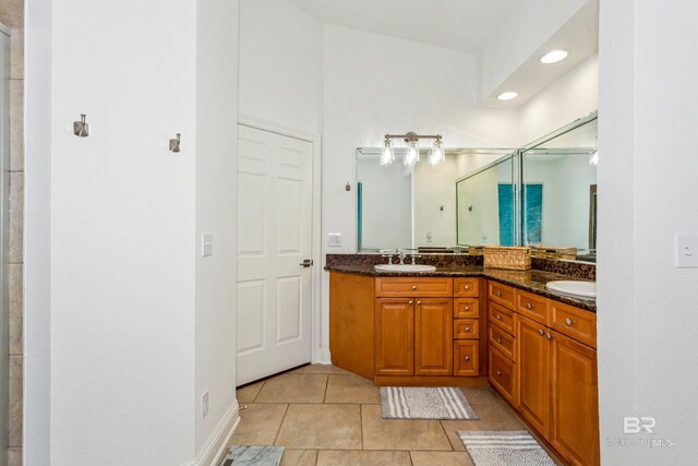 bathroom featuring tile patterned floors and vanity