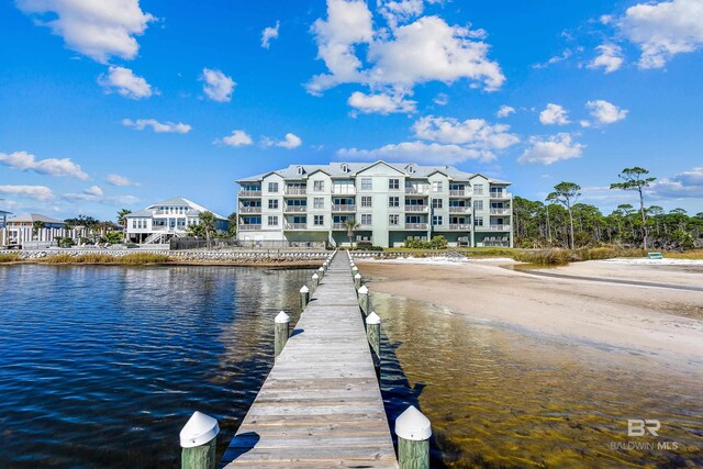 view of dock with a water view