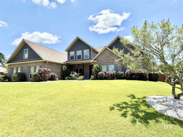 31610 Spoonbill Rd, Spanish Fort, AL 36527 - view of front of house with brick siding and a front lawn