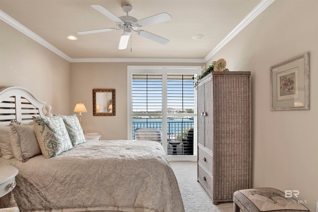 bedroom with crown molding, a water view, ceiling fan, and light colored carpet