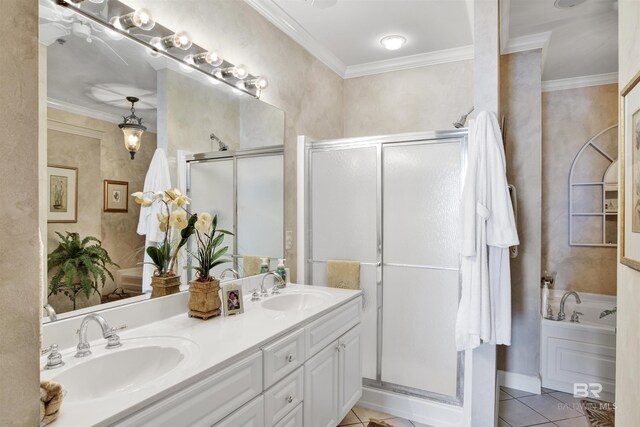 bathroom featuring crown molding, tile patterned flooring, and dual bowl vanity