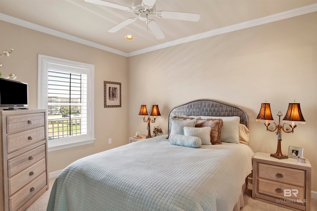 carpeted bedroom featuring ornamental molding and ceiling fan