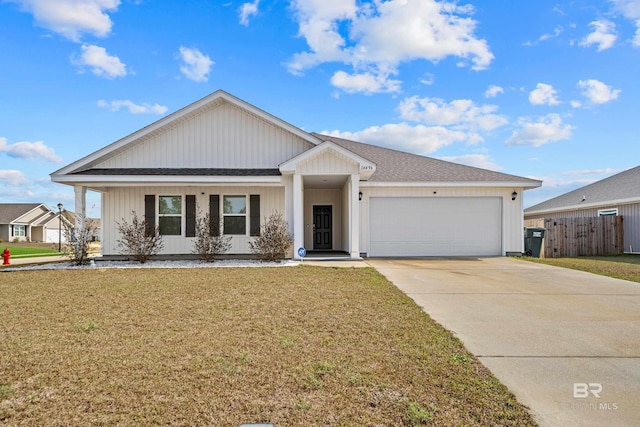 ranch-style house with a garage, a porch, and a front lawn