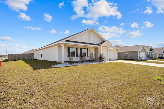 ranch-style home with a garage and a front lawn