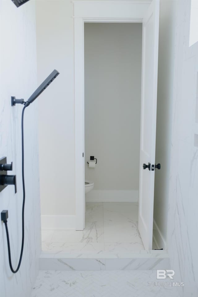 21767 Gallery Blvd, Fairhope, AL 36532 - bathroom with toilet, marble finish flooring, and baseboards