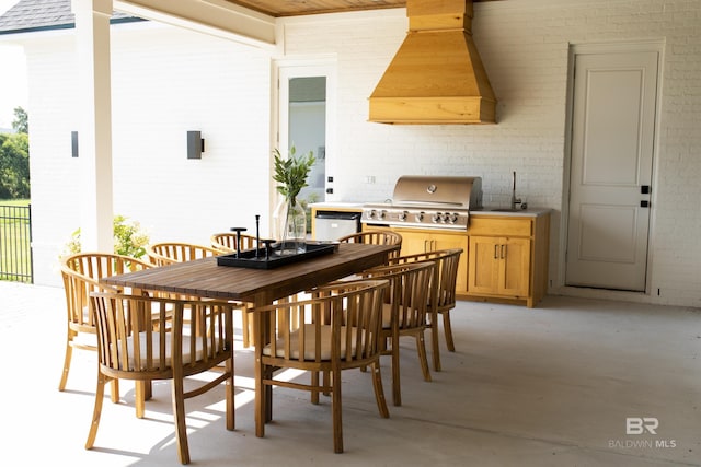21767 Gallery Blvd, Fairhope, AL 36532 - dining space featuring brick wall
