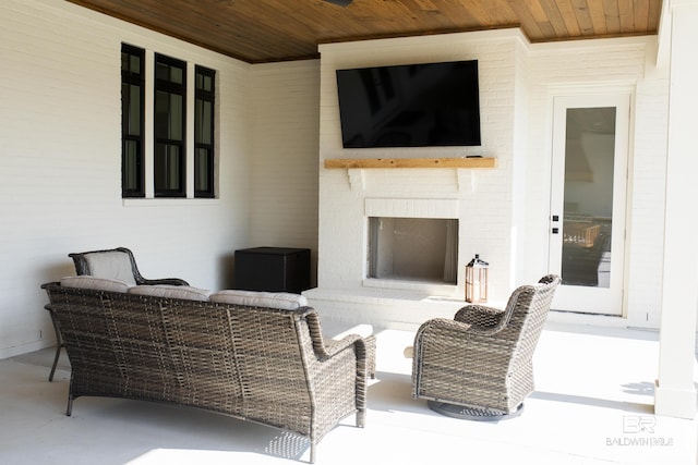 21767 Gallery Blvd, Fairhope, AL 36532 - view of patio / terrace with an outdoor living space with a fireplace
