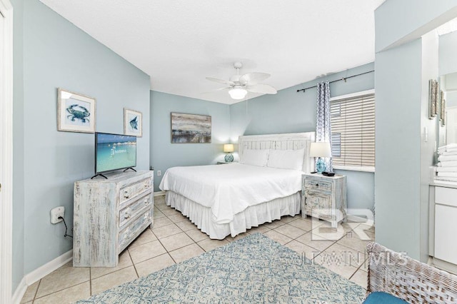 tiled bedroom with ceiling fan