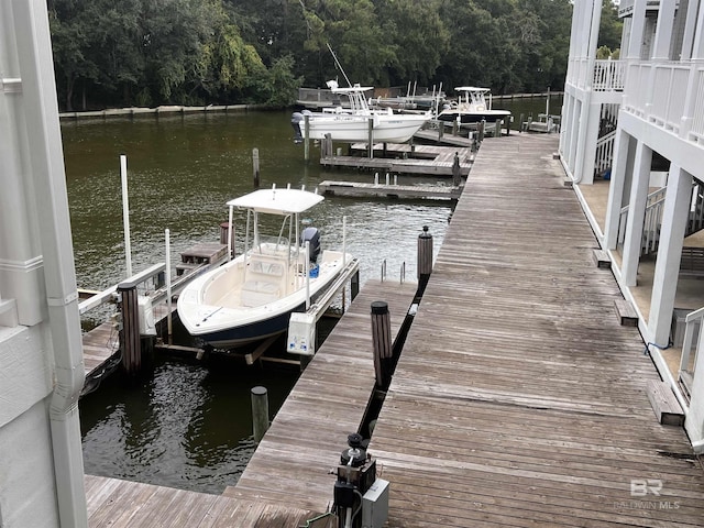 18175 Scenic Highway 98 Unit 12, Fairhope, AL 36532 - dock featuring a water view, boat lift, and a view of trees