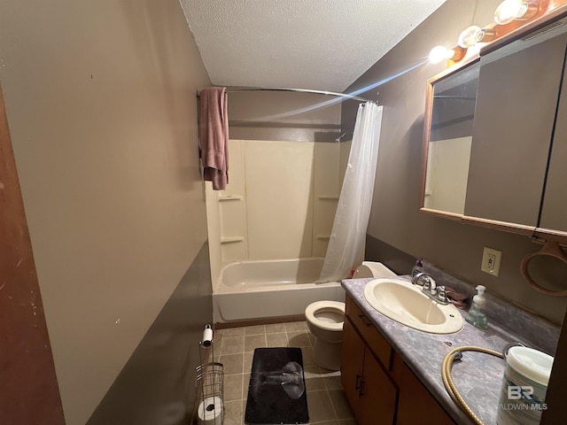 full bathroom featuring vanity, tile patterned floors, toilet, a textured ceiling, and shower / tub combo with curtain