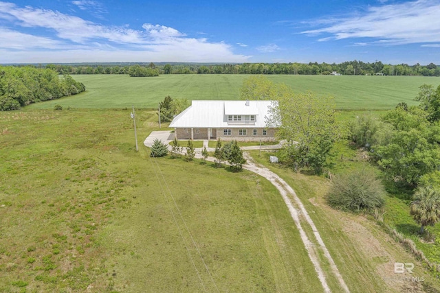 birds eye view of property with a rural view