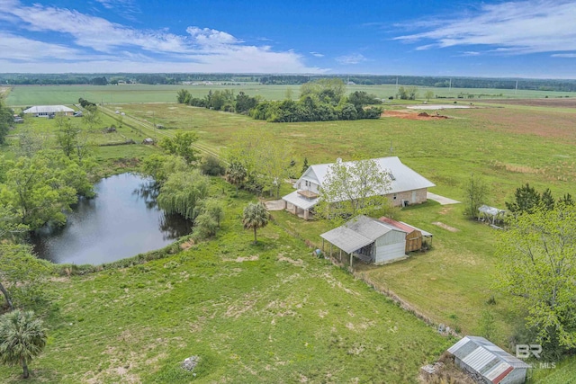 bird's eye view featuring a rural view and a water view