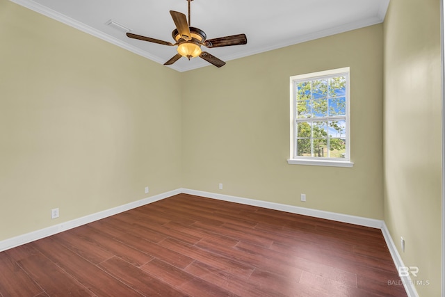 unfurnished room featuring crown molding, baseboards, a ceiling fan, and dark wood-style flooring