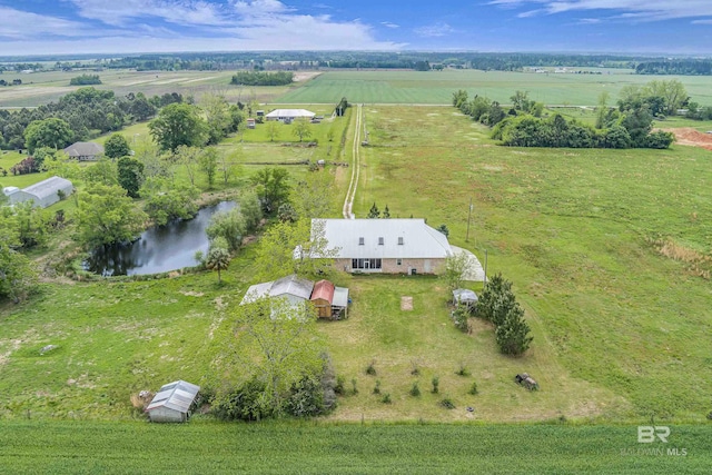 drone / aerial view with a rural view and a water view