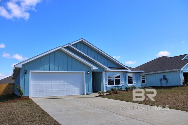 ranch-style home with board and batten siding, driveway, and a garage
