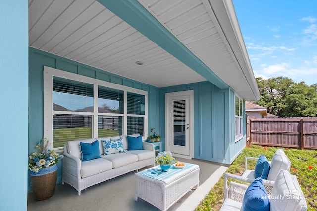 7074 Abigail St, Gulf Shores, AL 36542 - view of patio / terrace with an outdoor hangout area and fence