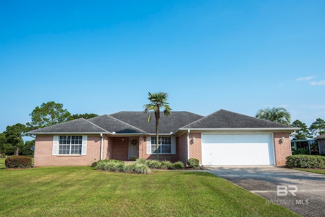 ranch-style house featuring a front lawn and a garage