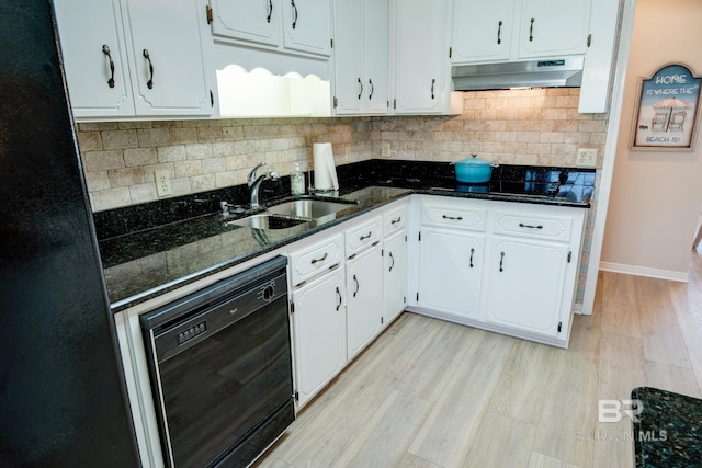 kitchen featuring decorative backsplash, white cabinets, light hardwood / wood-style flooring, black appliances, and sink