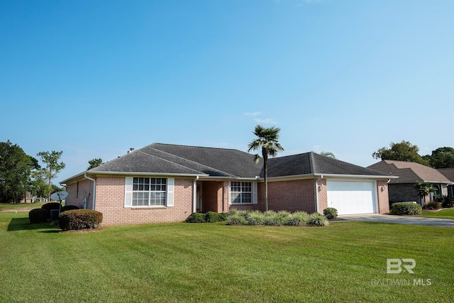 ranch-style home featuring a front lawn and a garage