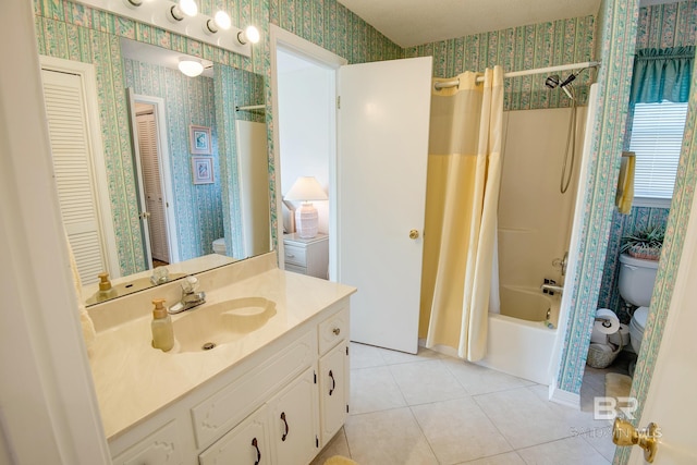 full bathroom with vanity, toilet, tile patterned floors, and shower / bathtub combination with curtain