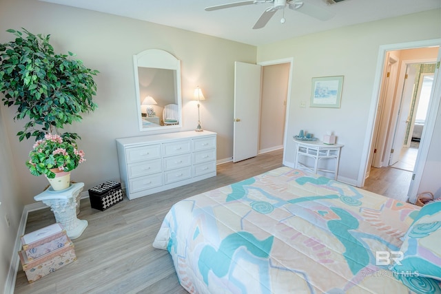 bedroom featuring light hardwood / wood-style flooring and ceiling fan