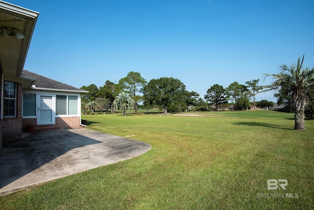 view of yard with a patio