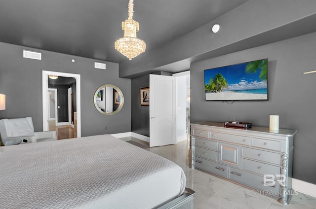 bedroom with a chandelier