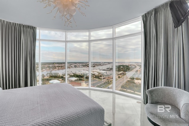 bedroom with floor to ceiling windows