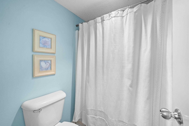 26802 Perdido Beach Blvd Unit 1008, Orange Beach, AL 36561 - bathroom with toilet and curtained shower