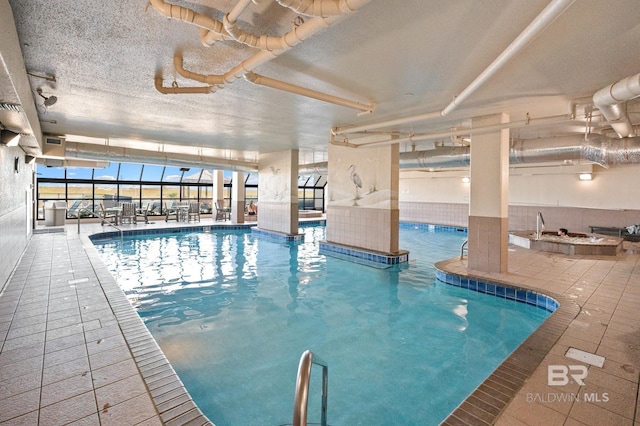 26802 Perdido Beach Blvd Unit 1008, Orange Beach, AL 36561 - indoor pool with a patio