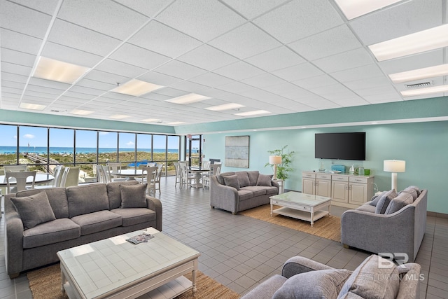 26802 Perdido Beach Blvd Unit 1008, Orange Beach, AL 36561 - living area with a paneled ceiling and tile patterned flooring