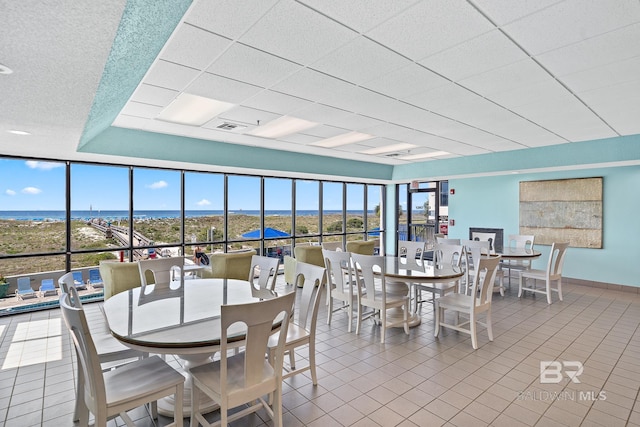 26802 Perdido Beach Blvd Unit 1008, Orange Beach, AL 36561 - dining room featuring tile patterned flooring and baseboards