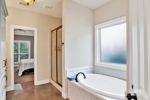 bathroom with separate shower and tub and concrete floors