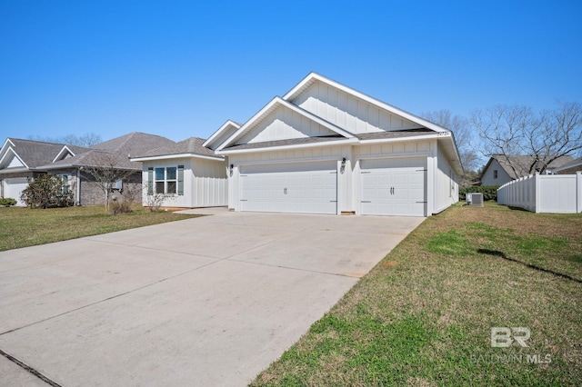 single story home featuring board and batten siding, fence, a garage, driveway, and a front lawn