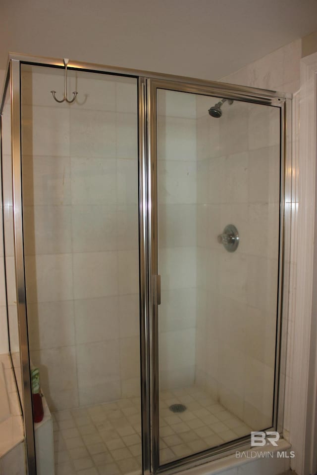 bathroom featuring an enclosed shower