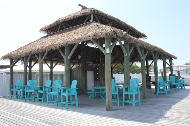 exterior space featuring a wooden deck and a gazebo