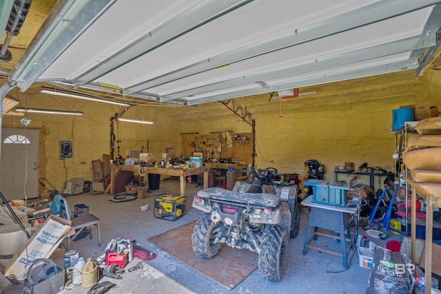 garage with a workshop area