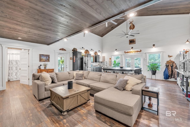 30857 Cypress St, Perdido Beach, AL 36530 - living room featuring dark wood-type flooring, ceiling fan, a wooden ceiling with exposed beams, and high vaulted ceiling