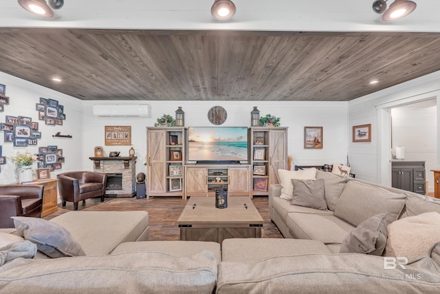 30857 Cypress St, Perdido Beach, AL 36530 - living area featuring a wall mounted air conditioner, dark wood-style flooring, a stone fireplace, wooden ceiling, and recessed lighting