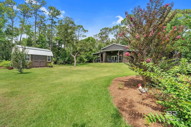 30857 Cypress St, Perdido Beach, AL 36530 - view of grassy yard featuring a shed