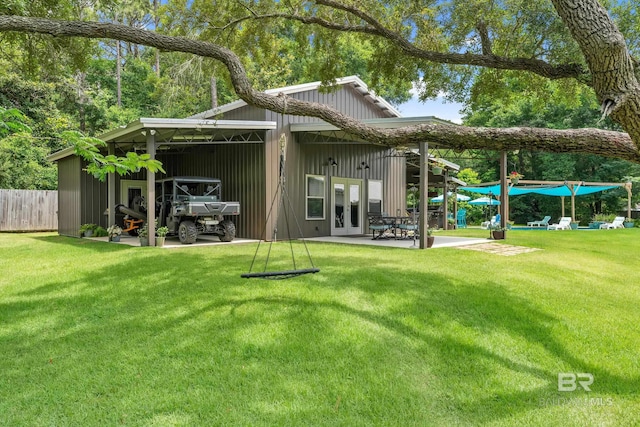 30857 Cypress St, Perdido Beach, AL 36530 - back of house featuring a patio and french doors