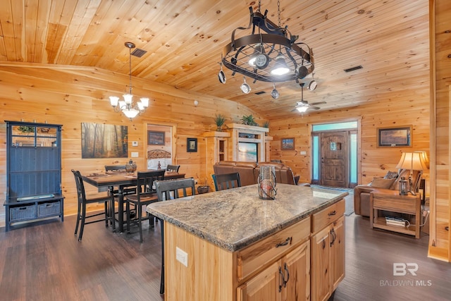 30857 Cypress St, Perdido Beach, AL 36530 - kitchen featuring vaulted ceiling, open floor plan, a chandelier, dark wood-style flooring, and wood ceiling