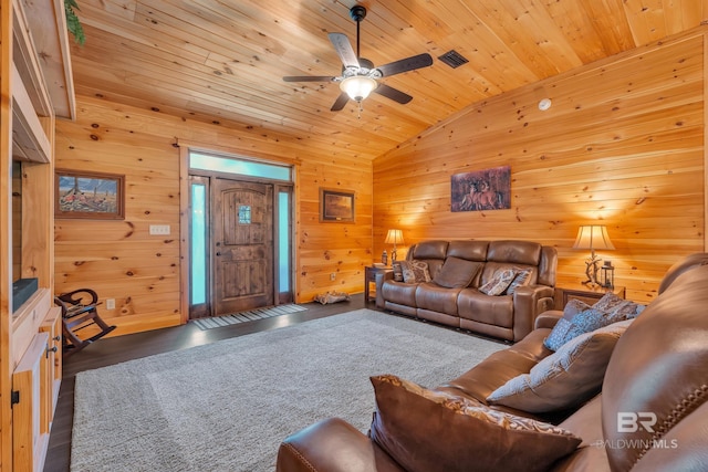 30857 Cypress St, Perdido Beach, AL 36530 - living area with lofted ceiling, wood ceiling, wooden walls, ceiling fan, and wood finished floors