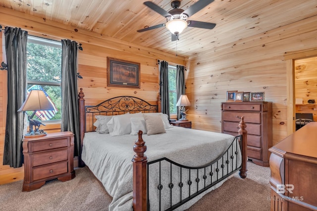 30857 Cypress St, Perdido Beach, AL 36530 - bedroom with carpet floors, wood ceiling, wooden walls, and a ceiling fan