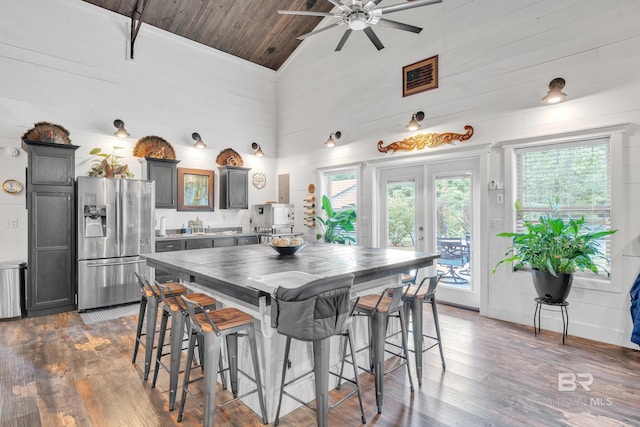 30857 Cypress St, Perdido Beach, AL 36530 - kitchen featuring stainless steel fridge with ice dispenser, high vaulted ceiling, wood finished floors, wood ceiling, and french doors