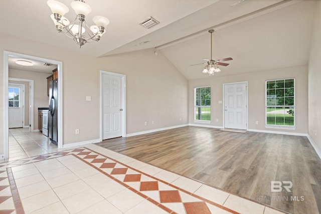 10966 Brighton Dr, Chunchula, AL 36521 - unfurnished living room featuring ceiling fan, baseboards, a chandelier, and light wood-style flooring