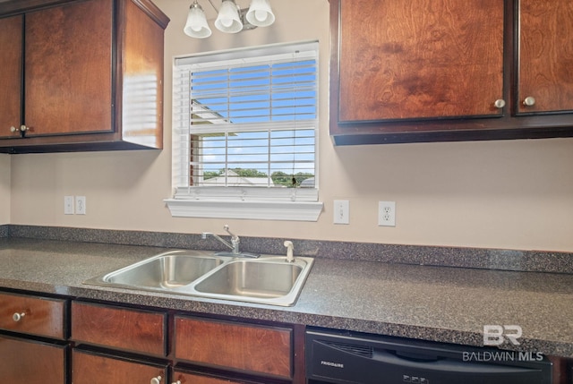 10966 Brighton Dr, Chunchula, AL 36521 - kitchen featuring black dishwasher, a sink, and dark countertops